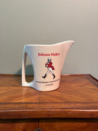 Vintage mid-century Johnnie Walker ceramic pub water jug featuring German branding