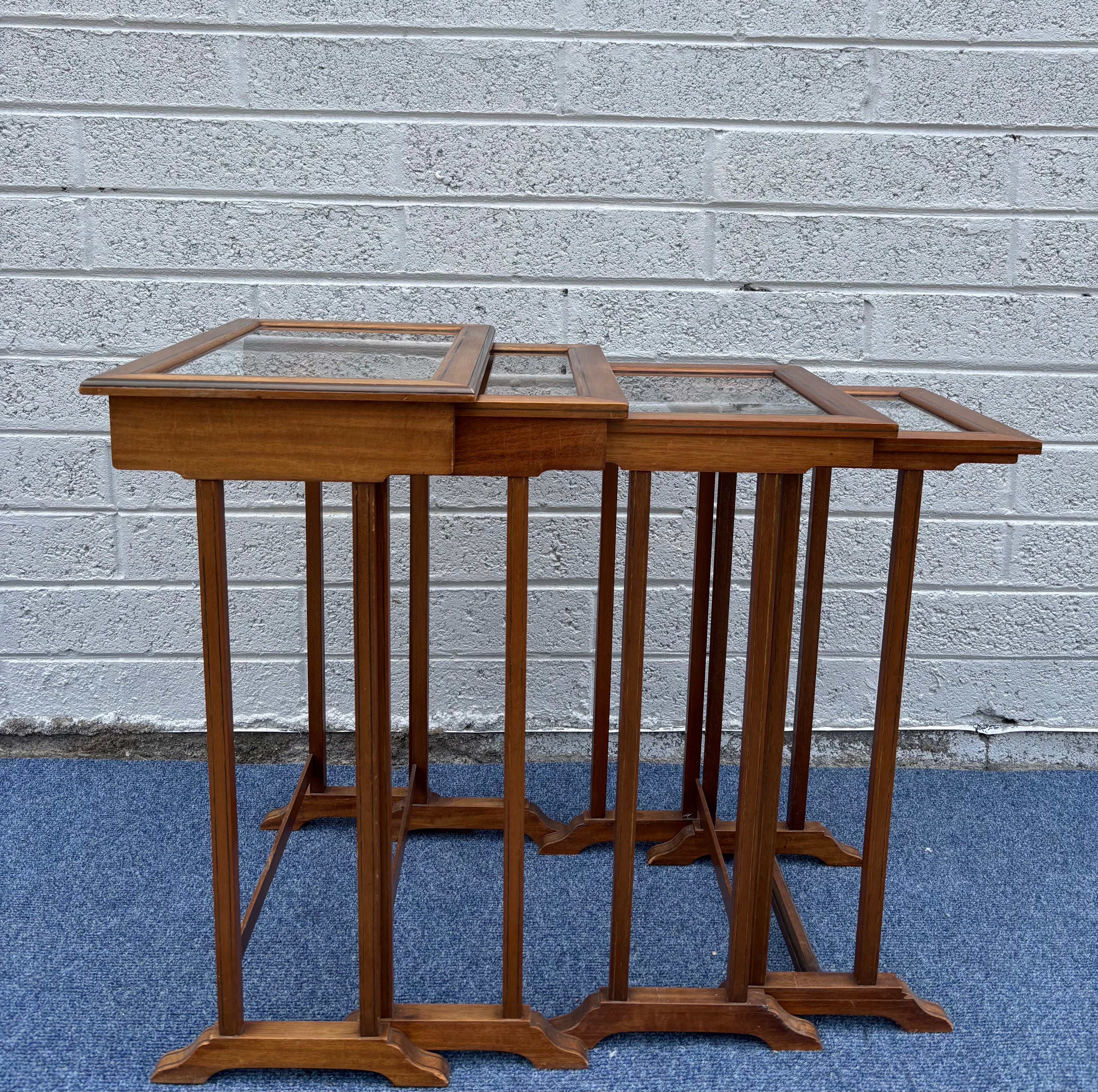 Set of Four Art Nouveau Nesting Tables (c. 1900)